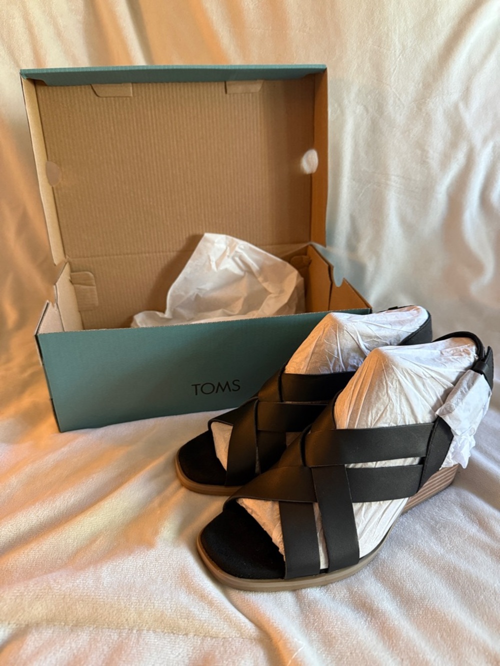 TOMS Black Leather Crisscross Wedge Sandal with Tan Wedge